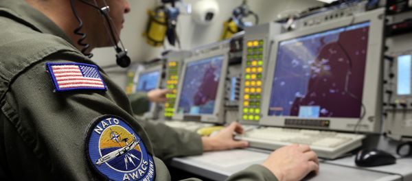 A controller monitors is seen screening aboard a NATO AWACS (Airborne Warning and Control Systems) aircraft during a surveillance flight over Romania in this April 16, 2014. A controller monitors is seen screening aboard a NATO AWACS (Airborne Warning and Control Systems) aircraft during a surveillance flight over Romania in this April 16, 2014. - Sputnik International