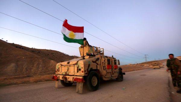 Iraqi Kurdish forces take part in an operation in northern Iraq backed by US-led strikes - Sputnik International