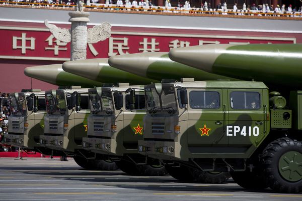 Military vehicles carrying DF-26 ballistic missiles drive past Tiananmen Gate during a military parade at Tiananmen Square in Beijing on September 3, 2015, to mark the 70th anniversary of victory over Japan and the end of World War II Military vehicles carrying DF-26 ballistic missiles drive past Tiananmen Gate during a military parade at Tiananmen Square in Beijing on September 3, 2015, to mark the 70th anniversary of victory over Japan and the end of World War II - Sputnik International