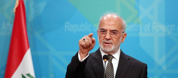 Iraqi Foreign Minister Ibrahim al-Jaafari speaks during a news conference in Baghdad, Iraq, Wednesday, Dec. 30, 2015 - Sputnik International