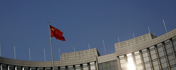A Chinese national flag flies at the headquarters of the People's Bank of China, the country's central bank, in Beijing, China, January 19, 2016 A Chinese national flag flies at the headquarters of the People's Bank of China, the country's central bank, in Beijing, China, January 19, 2016 - Sputnik International