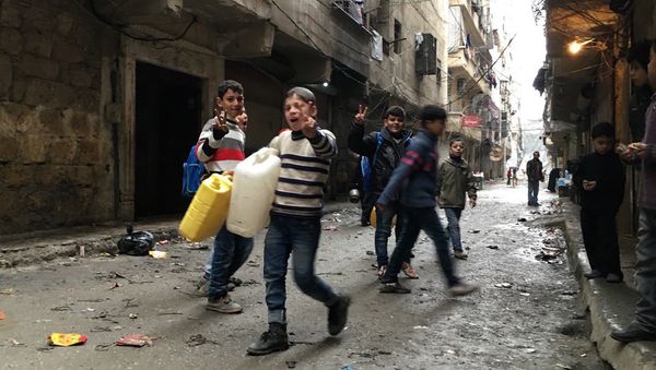 Children in Nubel, north of Aleppo province in Syria, after the town was released from a long-term siege - Sputnik International
