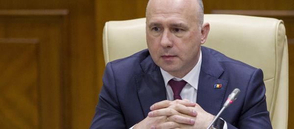 Moldova's Democratic Party member of parliament and newly elected prime minister Pavel Filip attends a session of parliament in Chisinau, Moldova, January 20, 2016 - Sputnik International