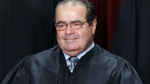 U.S. Supreme Court Justice Antonin Scalia is seen during a group portrait in the East Conference Room at the Supreme Court Building in Washington, in this file photo taken October 8, 2010. - Sputnik International