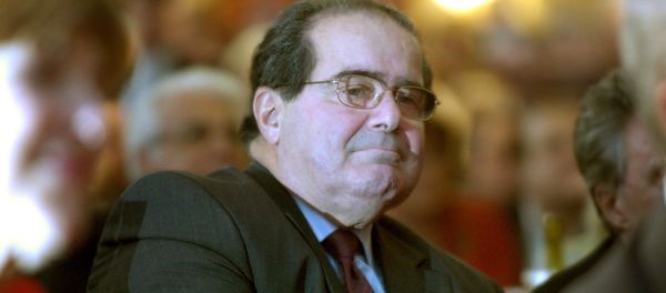 U.S. Supreme Court Justice Antonin Scalia sits in the audience at a National Italian American Foundation event in Washington, in this file photo taken October 20, 2006. - Sputnik International