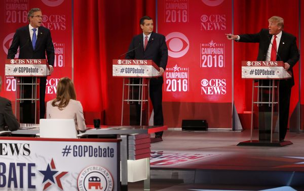 Republican U.S. presidential candidates former Governor Jeb Bush (L) and businessman Donald Trump (R) speak simultaneously about the war in Iraq and the record of Bush's brother, former President George W. Bush, as Senator Ted Cruz (C) looks on during the Republican U.S. presidential candidates debate sponsored by CBS News and the Republican National Committee in Greenville, South Carolina February 13, 2016. - Sputnik International