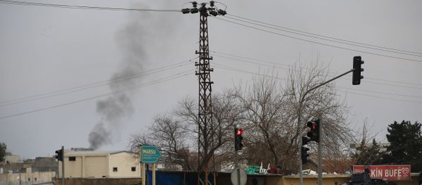 Smoke billows from a fire at the southeastern town of Nusaybin, Turkey, near the border with Syria, where Turkish security forces are battling militants linked to the Kurdistan Workers Party or PKK, Sunday, Feb. 14, 2016. Smoke billows from a fire at the southeastern town of Nusaybin, Turkey, near the border with Syria, where Turkish security forces are battling militants linked to the Kurdistan Workers Party or PKK, Sunday, Feb. 14, 2016. - Sputnik International