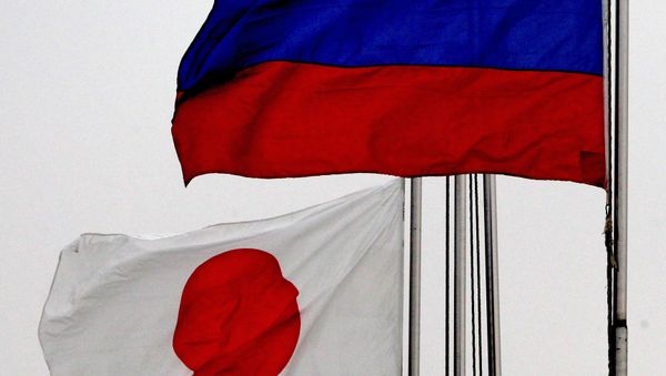 Russian and Japanese flags Russian and Japanese flags - Sputnik International