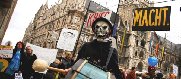 A protester takes part in a demonstration against the Munich Security Conference in downtown Munich, Germany, February 13, 2016. A protester takes part in a demonstration against the Munich Security Conference in downtown Munich, Germany, February 13, 2016. - Sputnik International