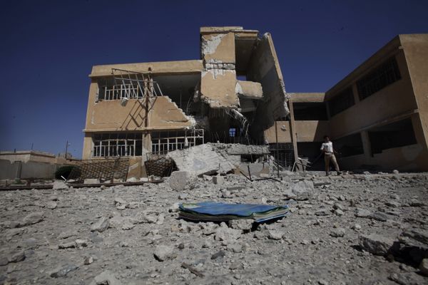 A book is left on the ground at the yard of a school in Tel Rifaat, on the outskirts of Aleppo, Syria. File photo  - Sputnik International