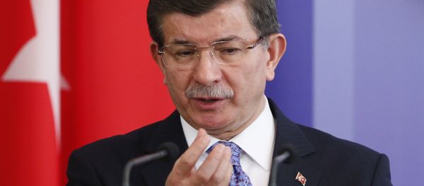 Turkish Prime Minister Ahmet Davutoglu gestures as he attends a news conference after a meeting with his Ukrainian counterpart Arseny Yatseniuk in Kiev, Ukraine February 15, 2016. Turkish Prime Minister Ahmet Davutoglu gestures as he attends a news conference after a meeting with his Ukrainian counterpart Arseny Yatseniuk in Kiev, Ukraine February 15, 2016. - Sputnik International