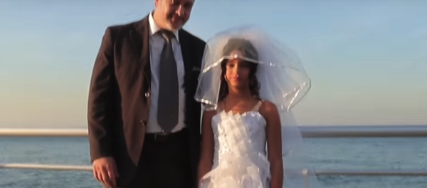 Screenshot from a video campaign depicting a child marriage in Lebanon Screenshot from a video campaign depicting a child marriage in Lebanon - Sputnik International