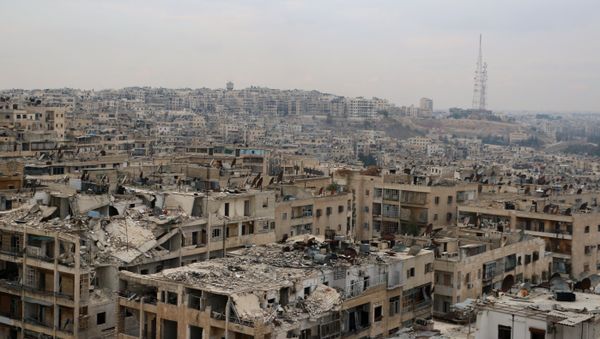 A picture taken on November 24, 2014, shows damaged buildings in the rebel-held Ansari disctrict of the northern Syrian city of Aleppo. - Sputnik International