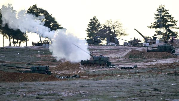 Tanks stationed at a Turkish army position near the Oncupinar crossing gate close to the town of Kilis, south central Turkey, fire towards the Syria border, on February 16, 2016. Tanks stationed at a Turkish army position near the Oncupinar crossing gate close to the town of Kilis, south central Turkey, fire towards the Syria border, on February 16, 2016. - Sputnik International