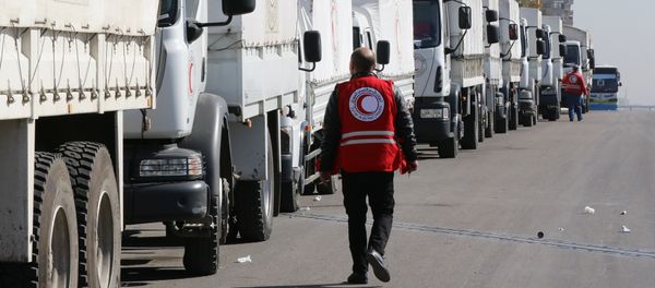 A Red Crescent convoy prepares to leave Damascus to the besieged areas of Madaya and Zabadani, on February 17, 2016 during an operation in cooperation with the UN to deliver aid to thousands of besieged Syrians A Red Crescent convoy prepares to leave Damascus to the besieged areas of Madaya and Zabadani, on February 17, 2016 during an operation in cooperation with the UN to deliver aid to thousands of besieged Syrians - Sputnik International