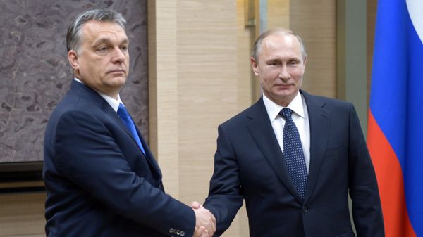 Russian President Vladimir Putin, right, and Hungarian Prime Minister Viktor Orban during a meeting at Novo-Ogaryovo residence in the Moscow Region - Sputnik International