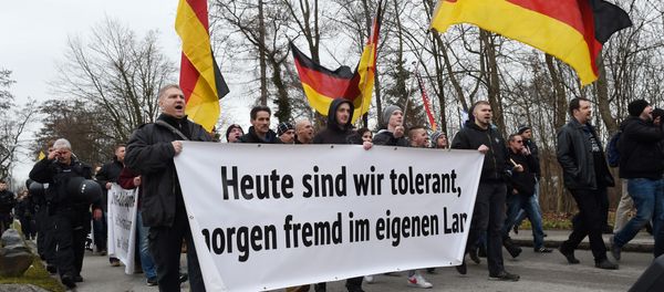 Protesters of the far right league We are the border (Wir sind die Grenze) carry a banner reading Today tolerant, tomorrow a stranger in his own country during a demonstration in Freilassing, southern Germany, on January 9, 2016. Protesters of the far right league We are the border (Wir sind die Grenze) carry a banner reading Today tolerant, tomorrow a stranger in his own country during a demonstration in Freilassing, southern Germany, on January 9, 2016. - Sputnik International