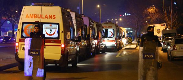 Turkish police secure the site of an explosion after an attack targeted a convoy of military service vehicles in Ankara on February 17, 2016 - Sputnik International