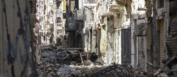 Street is filled with debris and abandoned houses in the city of Benghazi, Libya (File) - Sputnik International