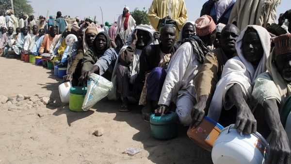 Internally Displaced Persons (IDP) mostly men sit in line waiting to be served with food at Dikwa Camp, in Borno State in north-eastern Nigeria, on February 2, 2016 Internally Displaced Persons (IDP) mostly men sit in line waiting to be served with food at Dikwa Camp, in Borno State in north-eastern Nigeria, on February 2, 2016 - Sputnik International
