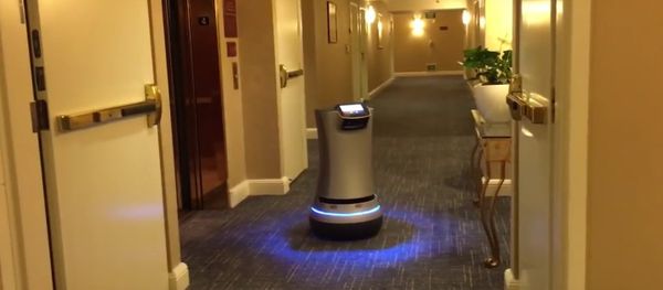 Hotel Room Service Robot Delivering Snack - Sputnik International