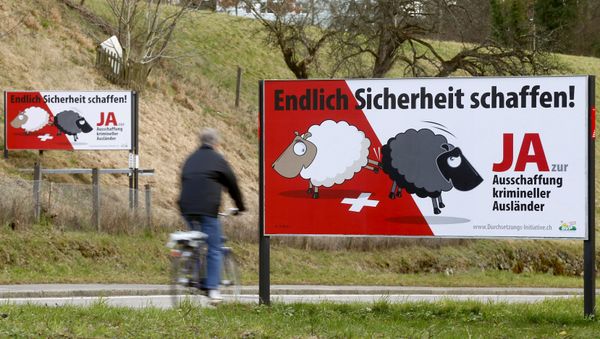 Posters of Swiss People's Party (SVP) demanding to deport criminal foreigners are displayed beside a road in Adliswil, Switzerland February 11, 2016 Posters of Swiss People's Party (SVP) demanding to deport criminal foreigners are displayed beside a road in Adliswil, Switzerland February 11, 2016 - Sputnik International