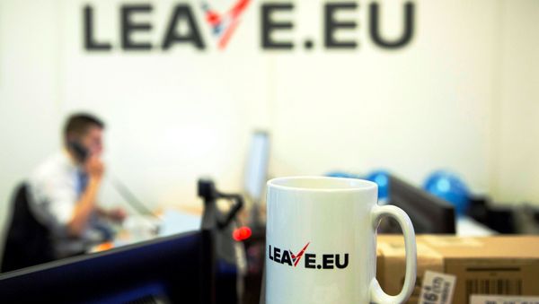 A worker answers a telephone in the office of Brexit group pressure group Leave.eu in London, Britain. - Sputnik International