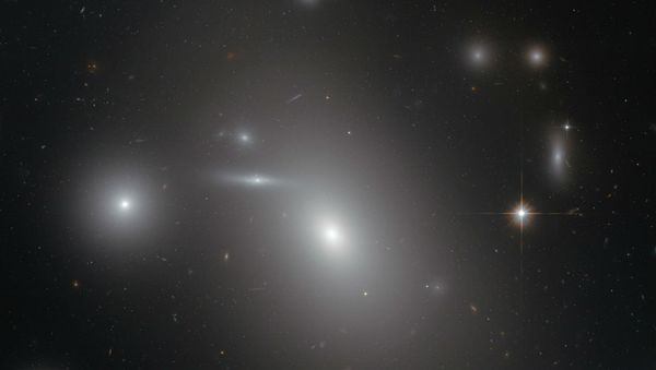 Located near this photos center is NGC 4889. Located near this photos center is NGC 4889. - Sputnik International