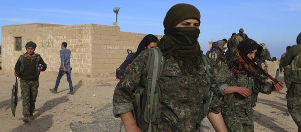 Fighters from the Democratic Forces of Syria carry their weapons in Ghazila village after taking control of the town from Islamic State forces in the southern countryside of Hasaka, Syria February 17, 2016 Fighters from the Democratic Forces of Syria carry their weapons in Ghazila village after taking control of the town from Islamic State forces in the southern countryside of Hasaka, Syria February 17, 2016 - Sputnik International