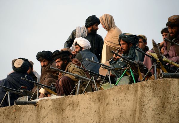 In this photograph taken on November 3, 2015, Afghan Taliban fighters listen to Mullah Mohammad Rasool Akhund (unseen), the newly appointed leader of a breakaway faction of the Taliban, at Bakwah in the western province of Farah - Sputnik International