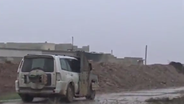 a screenshot-Child jihadi kisses father goodbye before blowing himself up - Sputnik International