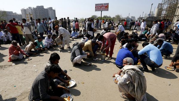 Demonstrators from the Jat community eat as they block the Delhi-Haryana national highway during a protest in New Delhi, India, February 21, 2016 Demonstrators from the Jat community eat as they block the Delhi-Haryana national highway during a protest in New Delhi, India, February 21, 2016 - Sputnik International