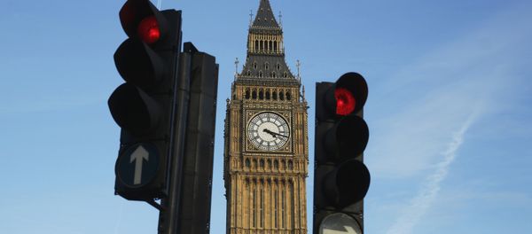 Red traffic lights stop traffic in front of the Big Ben bell tower at the Houses of Parliament in London, Britain February 22, 2016. Red traffic lights stop traffic in front of the Big Ben bell tower at the Houses of Parliament in London, Britain February 22, 2016. - Sputnik International