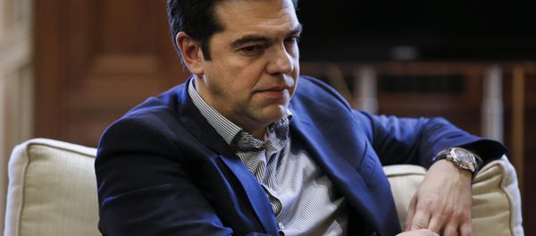 Greek Prime Minister Alexis Tsipras looks on during a meeting with Mayor of Piraeus Yannis Moralis (not pictured) at his office at the Maximos Mansion in Athens, Greece, February 11, 2016. - Sputnik International