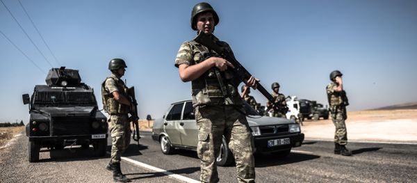 Turkish soldiers stand guar near the Turkey-Syrian border (File) Turkish soldiers stand guar near the Turkey-Syrian border (File) - Sputnik International