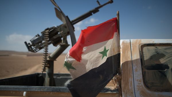 A Syrian flag on a truck with a machine gun of the Syrian Arab Army (SAA) near the town of Mhin, Syria A Syrian flag on a truck with a machine gun of the Syrian Arab Army (SAA) near the town of Mhin, Syria - Sputnik International