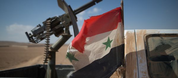 A Syrian flag on a truck with a machine gun of the Syrian Arab Army (SAA) near the town of Mhin, Syria - Sputnik International