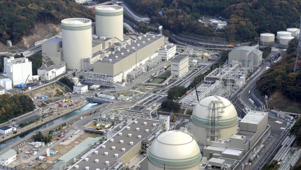 An aerial view shows No. 4 (front L), No. 3 (front R), No. 2 (rear L) and No. 1 reactor buildings at Kansai Electric Power Co.'s Takahama nuclear power plant in Takahama town, Fukui prefecture, in this file photo taken by Kyodo November 27, 2014 - Sputnik International