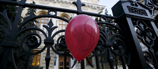 A balloon is seen during a rally of foreign currency mortgage holders near the Central Bank headquarters in central Moscow, Russia, February 8, 2016 A balloon is seen during a rally of foreign currency mortgage holders near the Central Bank headquarters in central Moscow, Russia, February 8, 2016 - Sputnik International