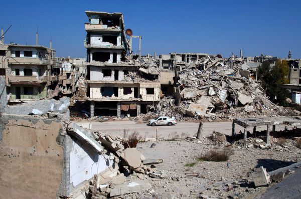 In this picture taken Friday, Feb. 26, 2016, a car drives through a devastated part of the old city of Homs, Syria In this picture taken Friday, Feb. 26, 2016, a car drives through a devastated part of the old city of Homs, Syria - Sputnik International