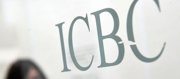 An office worker leaves the Industrial and Commercial Bank of China (ICBC) An office worker leaves the Industrial and Commercial Bank of China (ICBC) - Sputnik International