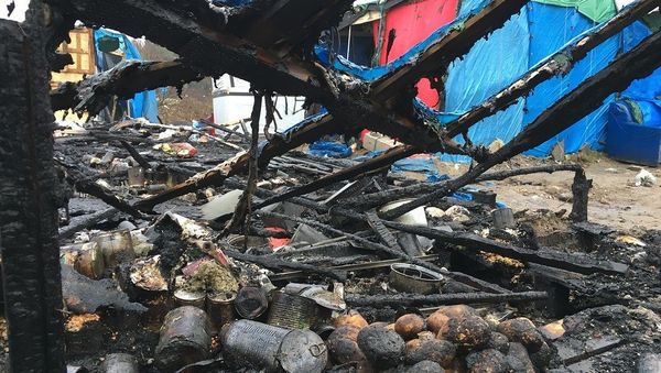 Jungle migrant camp in the French northern port city of Calais Jungle migrant camp in the French northern port city of Calais - Sputnik International