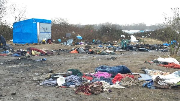 Jungle migrant camp in the French northern port city of Calais Jungle migrant camp in the French northern port city of Calais - Sputnik International