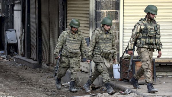 Turkish soldiers patrol in Sur district, which is partially under curfew, in the Kurdish-dominated southeastern city of Diyarbakir Turkish soldiers patrol in Sur district, which is partially under curfew, in the Kurdish-dominated southeastern city of Diyarbakir - Sputnik International