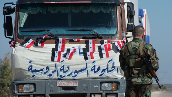 This file photo shows a convoy which delivered humanitarian aid in Syria This file photo shows a convoy which delivered humanitarian aid in Syria - Sputnik International