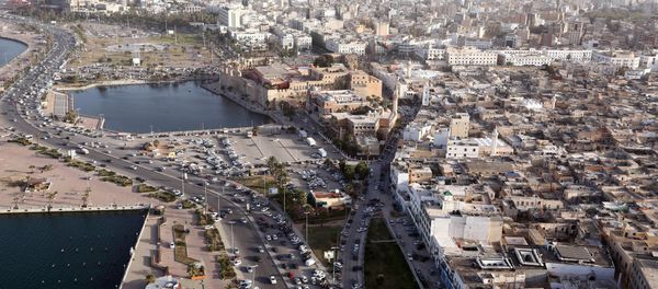 An aerial shot taken from a helicopter shows the Libyan capital Tripoli. (File) An aerial shot taken from a helicopter shows the Libyan capital Tripoli. (File) - Sputnik International