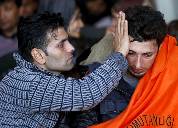 Refugees and migrants sit on board of Turkish Coast Guard Search and Rescue ship Umut-703 off the shores of Izmir, Turkey, after a failed attempt of crossing to the Greek island of Chios, February 28, 2016. Refugees and migrants sit on board of Turkish Coast Guard Search and Rescue ship Umut-703 off the shores of Izmir, Turkey, after a failed attempt of crossing to the Greek island of Chios, February 28, 2016. - Sputnik International