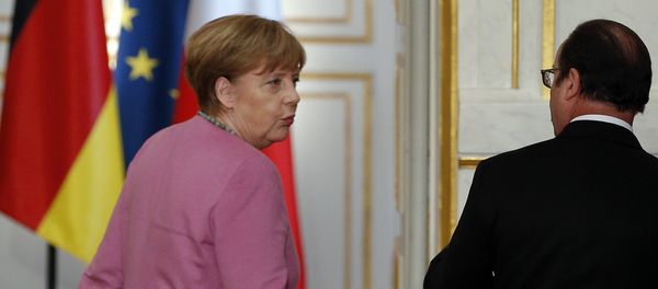 France's President Francois Hollande, right, and German chancellor Angela Merkel leave after a press conference at the Elysee Palace, in Paris, Friday, March 4, 2015. France's President Francois Hollande, right, and German chancellor Angela Merkel leave after a press conference at the Elysee Palace, in Paris, Friday, March 4, 2015. - Sputnik International