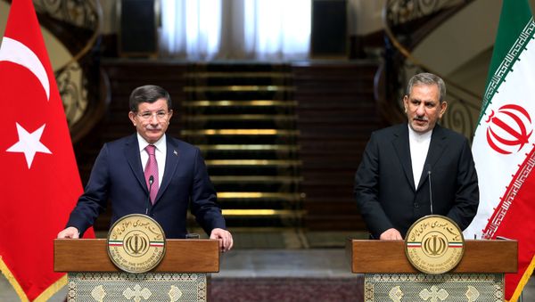Iranian Vice-President Eshagh Jahangiri, right, speaks with media in a joint press conference with Turkish Prime Minister Ahmet Davutoglu after their meeting at the Saadabad Palace in Tehran, Iran, Saturday, March 5, 2016 - Sputnik International