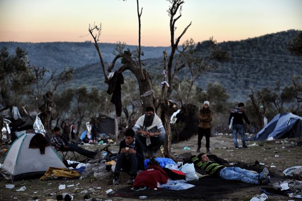 Refugees and migrants live at a field outside the Moria Hot Spot on the Greek Lesbos island on November 12, 2015 Refugees and migrants live at a field outside the Moria Hot Spot on the Greek Lesbos island on November 12, 2015 - Sputnik International